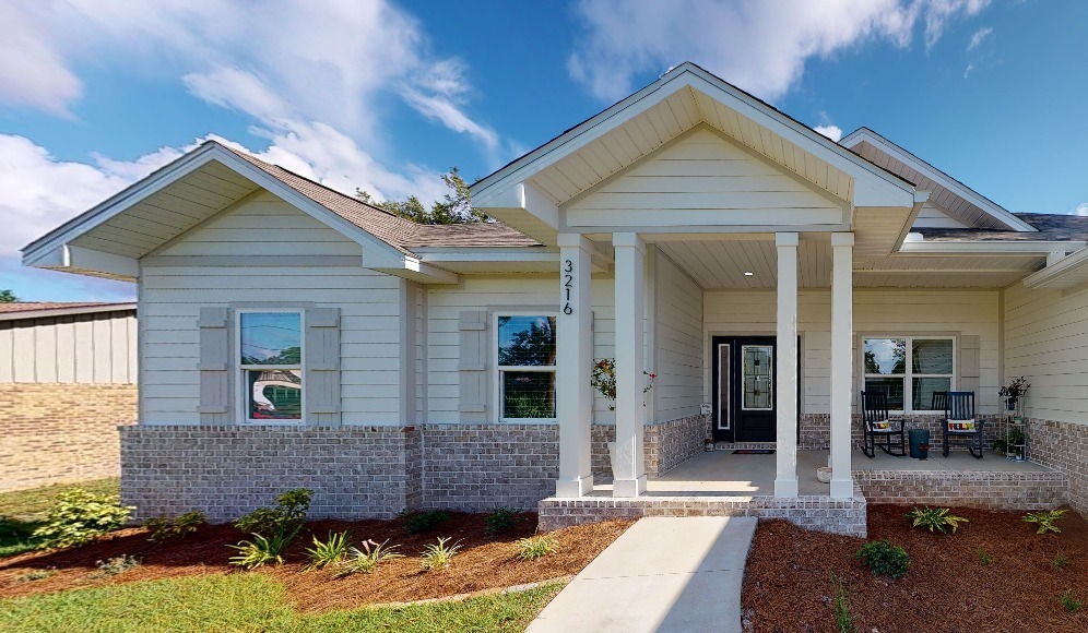 WhatsApp Image 2024-11-06 at 6.20.17 PM - EZ Modern Homes Modern spec home exterior in a Pensacola neighborhood